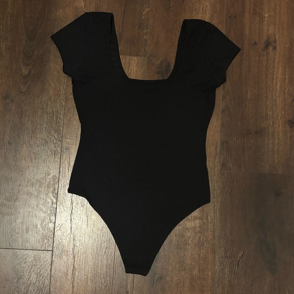 American Eagle short sleeve black body suit. Size small.